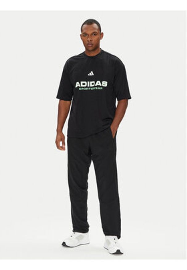 Adidas - adidas T-Shirt Common Goal JM1752 Czarny Loose Fit. Kolor: czarny. Materiał: syntetyk