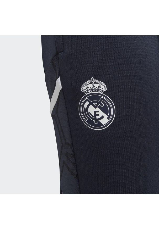Spodnie do piłki nożnej dla dzieci Adidas Real Madrid Condivo 22 Training. Kolor: niebieski. Materiał: dresówka, materiał. Sport: piłka nożna