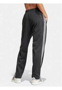 Adidas - adidas Spodnie dresowe adicolor Classics SST IS4102 Czarny Loose Fit. Kolor: czarny. Materiał: bawełna #3