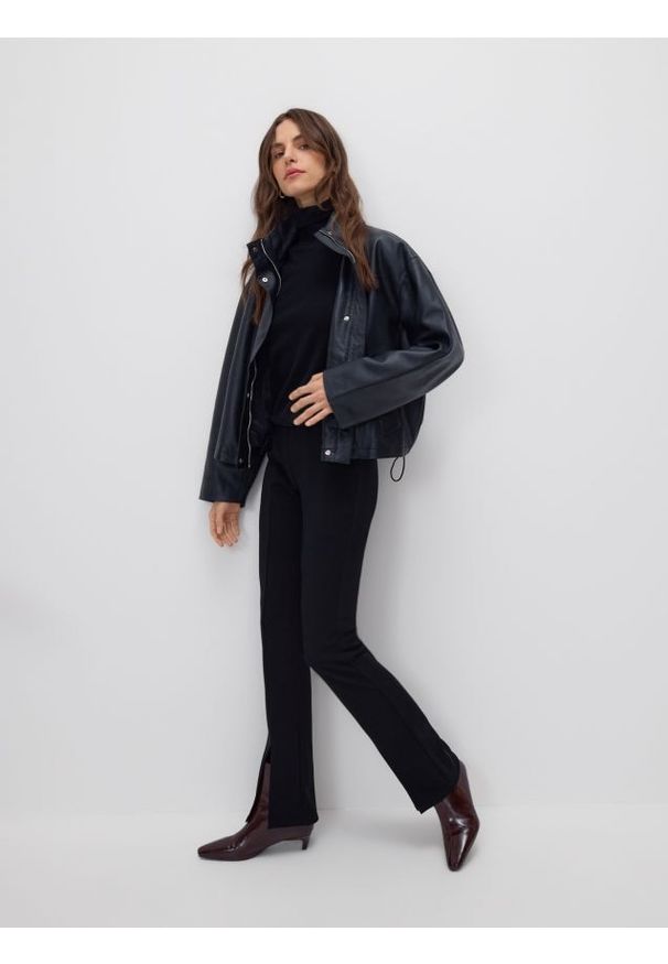 Reserved - Legginsy z rozcięciami - czarny. Kolor: czarny. Materiał: dzianina