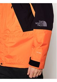 The North Face Kurtka outdoor Mountain Light NF0A3XY5 Pomarańczowy Regular Fit. Kolor: pomarańczowy. Materiał: syntetyk. Sport: outdoor