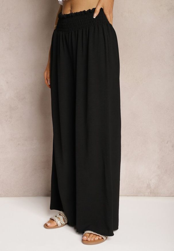 Renee - Czarne Spodnie High Waist z Szerokimi Nogawkami i Gumką w Pasie Risabessa. Okazja: na co dzień. Stan: podwyższony. Kolor: czarny. Styl: elegancki, casual