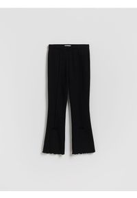 Reserved - Ocieplane legginsy flare z kokardkami - czarny. Kolor: czarny. Materiał: dzianina #1