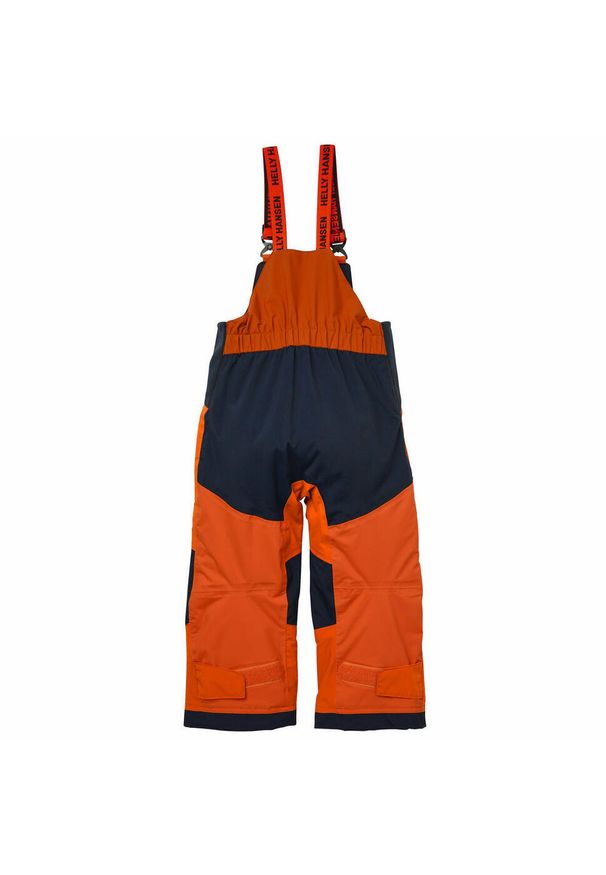 Kombinezony dziecięce Helly Hansen rider 2. Kolor: pomarańczowy. Sezon: zima. Sport: narciarstwo