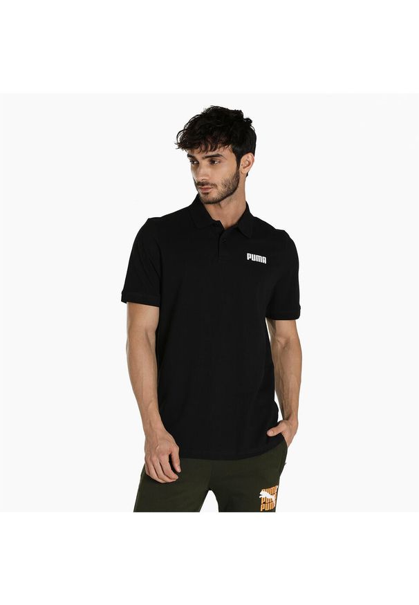 Puma Koszulka Polo Ess Pique 84722601. Typ kołnierza: polo. Kolor: czarny. Długość rękawa: krótki rękaw. Długość: krótkie