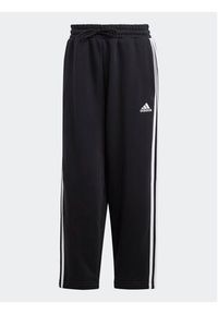 Adidas - adidas Spodnie dresowe Essentials 3-Stripes Open Hem Fleece HZ5748 Czarny Loose Fit. Kolor: czarny. Materiał: bawełna #4