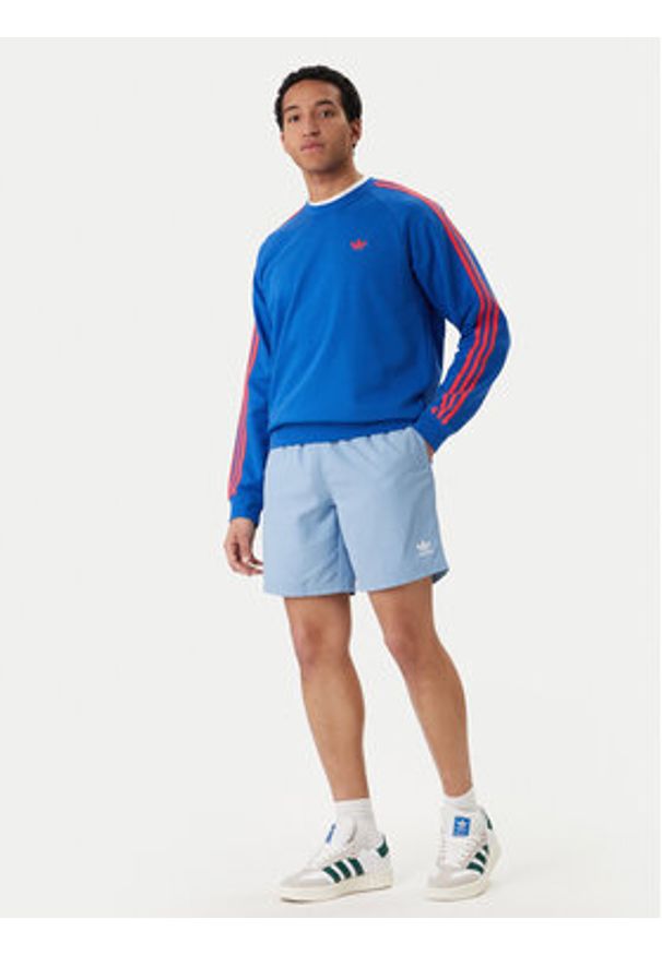 Adidas - adidas Szorty kąpielowe adicolor 3-Stripes JX5017 Błękitny Regular Fit. Kolor: niebieski. Materiał: syntetyk