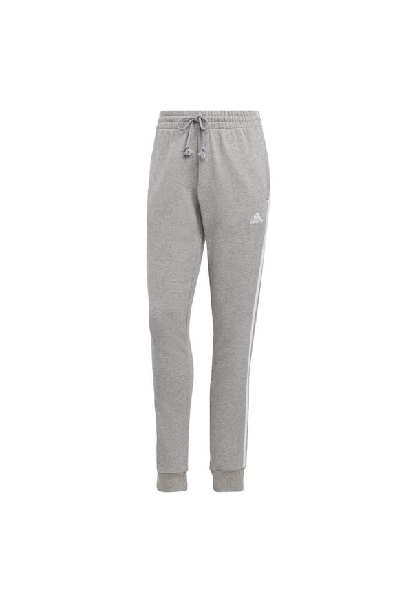 Adidas - Essentials 3-Stripes French Terry Cuffed Pants. Kolor: szary, biały, wielokolorowy. Materiał: materiał. Sport: fitness
