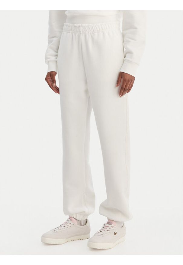 Lacoste Spodnie dresowe XF5244 Écru Regular Fit. Kolor: kremowy. Materiał: bawełna