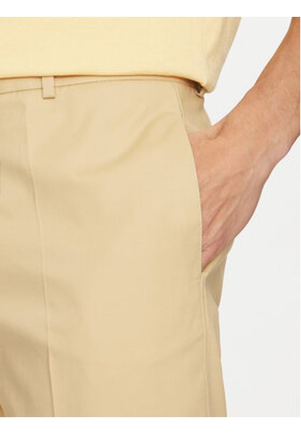 Marciano Guess Spodnie materiałowe 5GHB21 2304Z Beżowy Slim Fit. Kolor: beżowy. Materiał: bawełna