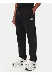 The North Face Spodnie dresowe TNF™ Essential Terry Simple Dome NF0A8FDF Czarny Regular Fit. Kolor: czarny. Materiał: bawełna #1