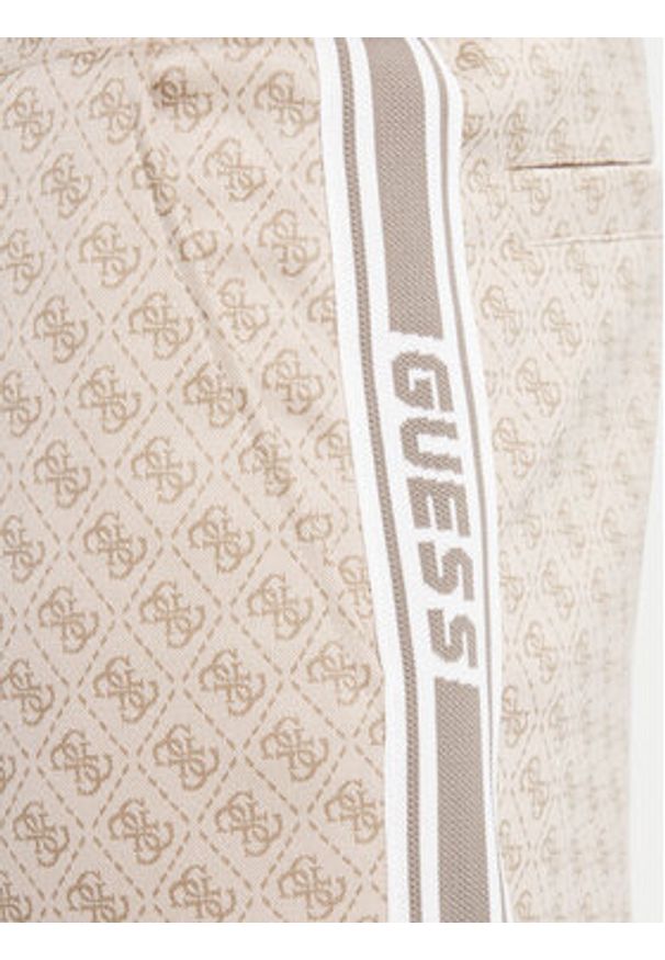 Guess Spodnie dresowe Z5BB19 K2042 Niebieski Regular Fit. Kolor: niebieski. Materiał: syntetyk