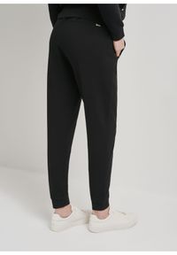 Ochnik - Czarne dresowe spodnie damskie. Kolor: czarny. Materiał: bawełna #4