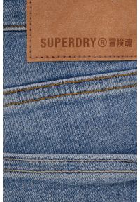 Superdry jeansy męskie. Kolor: niebieski