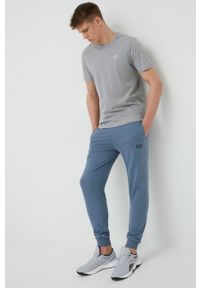 EA7 Emporio Armani - Spodnie. Kolor: niebieski. Materiał: dzianina #4