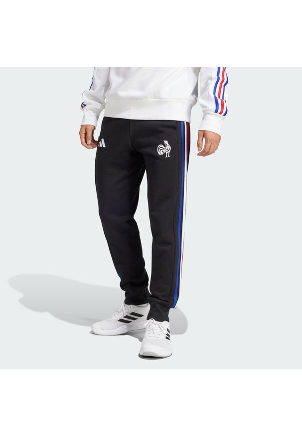 Adidas - Spodnie France Essentials 3-Stripes. Kolor: czarny. Materiał: dresówka. Sport: piłka nożna