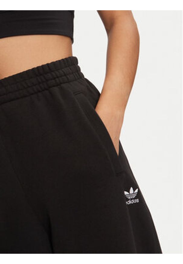 Adidas - adidas Spodnie dresowe Essentials Fleece IY9637 Czarny Loose Fit. Kolor: czarny. Materiał: bawełna