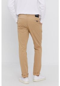Calvin Klein Jeans Spodnie męskie kolor beżowy dopasowane. Kolor: beżowy. Materiał: tkanina #4
