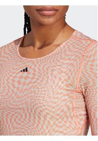 Adidas - adidas Bluzka Print Clash Long Sleeve Yoga Long-sleeve Top HT7324 Brązowy. Kolor: brązowy. Materiał: syntetyk. Długość rękawa: długi rękaw. Wzór: nadruk