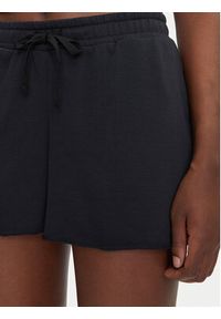 Under Armour Szorty sportowe Rival 1389657 Czarny Regular Fit. Kolor: czarny. Materiał: bawełna