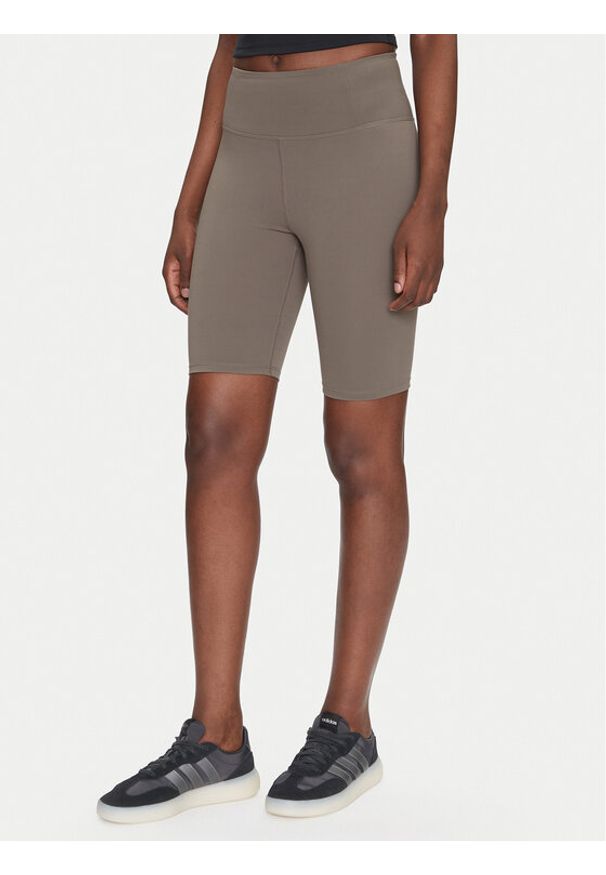 GIRLFRIEND COLLECTIVE - Girlfriend Collective Szorty sportowe Float 4023 Beżowy Slim Fit. Kolor: beżowy. Materiał: syntetyk