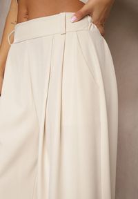 Renee - Beżowe Eleganckie Spodnie Palazzo z Szerokimi Nogawkami Adivisa. Stan: podwyższony. Kolor: beżowy. Styl: elegancki