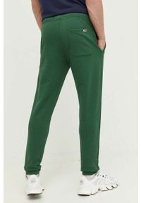 Tommy Jeans spodnie bawełniane kolor zielony gładkie. Kolor: zielony. Materiał: bawełna. Wzór: gładki #3