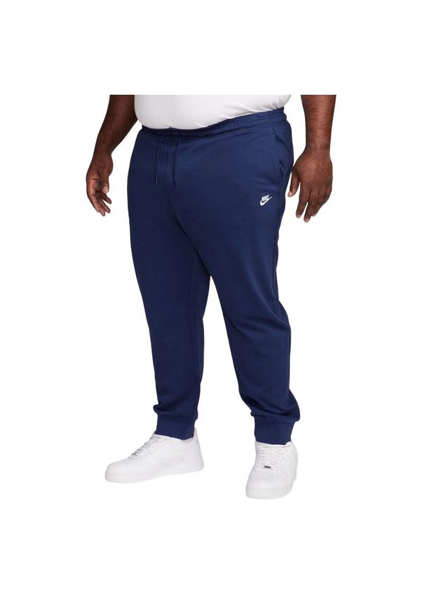 Nike - Męskie Spodnie Do Biegania Club Fleece. Kolor: niebieski. Materiał: dresówka