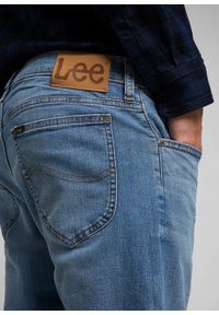 Lee - LEE RIDER MĘSKIE SPODNIE JEANSOWE JEANSY DŻINSY MID STONE WASH L701NLWL 112318844
