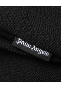 PALM ANGELS - Czarne spodnie dresowe z efektem ubrudzenia farbą. Kolor: czarny. Materiał: dresówka. Wzór: nadruk, kolorowy