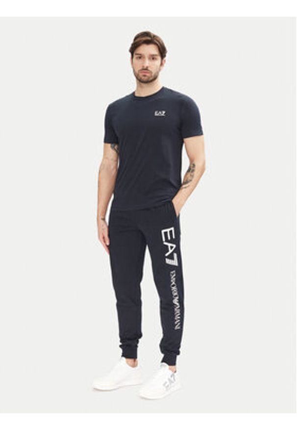 EA7 Emporio Armani Spodnie dresowe 7M000571 AF13512 MB149 Granatowy Regular Fit. Kolor: niebieski. Materiał: bawełna