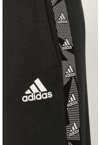 Adidas - adidas - Spodnie. Kolor: czarny. Materiał: bawełna, poliester, dzianina. Wzór: aplikacja #3