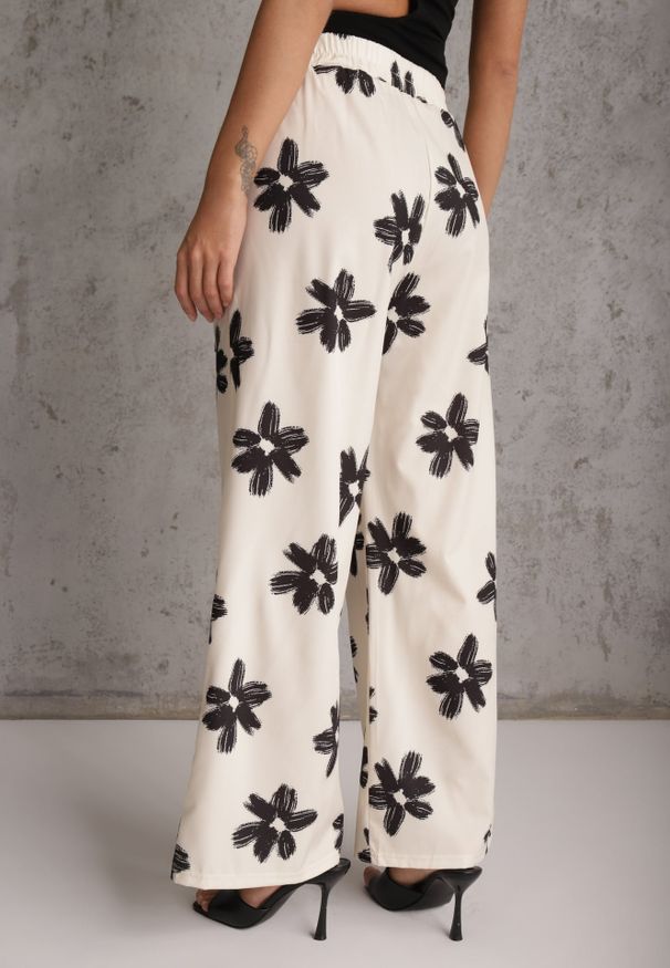 Renee - Czarno-Kremowe Szerokie Spodnie High Waist z Kwiatowym Printem i Wiązanym Paskiem Oramare. Okazja: na co dzień. Stan: podwyższony. Kolor: czarny. Długość: krótkie. Wzór: nadruk, kwiaty. Styl: boho, casual