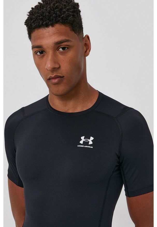 Under Armour t-shirt treningowy 1361518 kolor czarny 1361518-410. Kolor: czarny. Materiał: skóra, materiał. Długość rękawa: raglanowy rękaw. Wzór: gładki