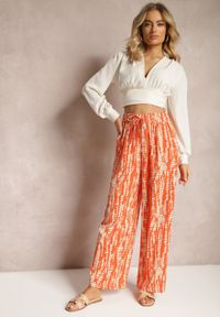 Renee - Pomarańczowe Spodnie z Szerokimi Nogawkami z Abstrakcyjnym Wzorem i Gumką w Pasie Sarieta. Kolor: pomarańczowy
