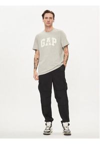 GAP - Gap Spodnie materiałowe 487058-00 Czarny Relaxed Fit. Kolor: czarny. Materiał: syntetyk