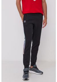 adidas Performance Spodnie męskie kolor czarny gładkie. Kolor: czarny. Materiał: dzianina, poliester. Wzór: gładki
