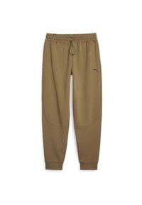 Spodnie Mężczyzna Puma Rad/Cal Dk Op brązowy. Kolor: zielony. Sport: fitness #1