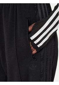 Adidas - adidas Spodnie dresowe Firebird Lace KD0351 Czarny Loose Fit. Kolor: czarny. Materiał: syntetyk, bawełna #3