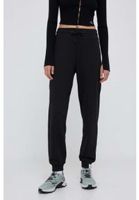 Calvin Klein Jeans spodnie dresowe kolor czarny gładkie. Kolor: czarny. Materiał: dresówka. Wzór: gładki #1