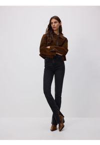 Reserved - Jeansy slim fit z rozcięciem - czarny. Kolor: czarny