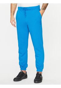 4f - 4F Spodnie dresowe 4FAW23TTROM453 Niebieski Regular Fit. Kolor: niebieski. Materiał: bawełna, syntetyk #1