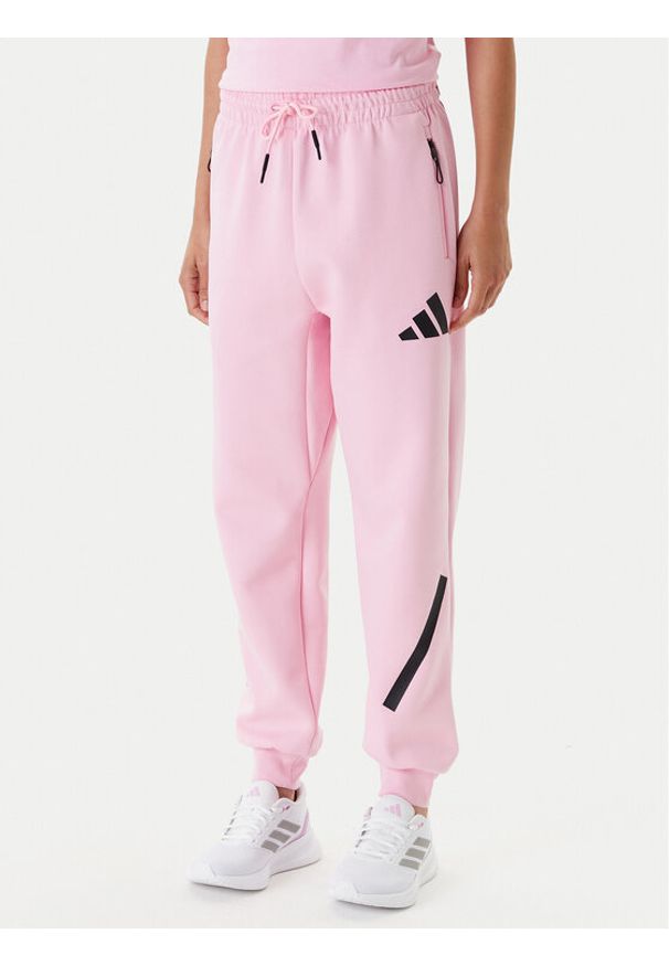 Adidas - adidas Spodnie dresowe Z.N.E. JC5405 Różowy Regular Fit. Kolor: różowy. Materiał: syntetyk, bawełna