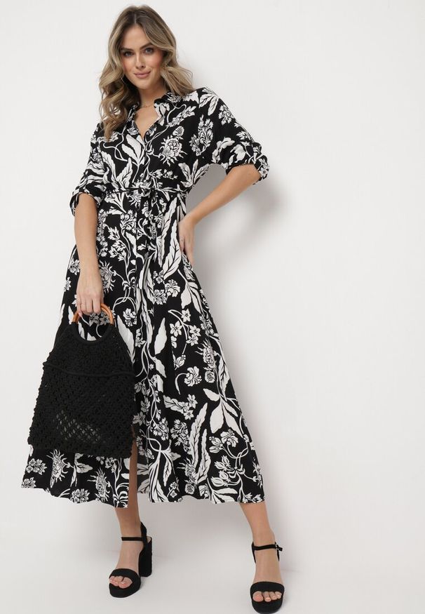 Born2be - Czarno-Biała Koszulowa Sukienka z Roślinnym Wzorem z Wiązanym Paskiem Rosallen. Kolor: czarny. Wzór: aplikacja. Typ sukienki: koszulowe. Długość: maxi