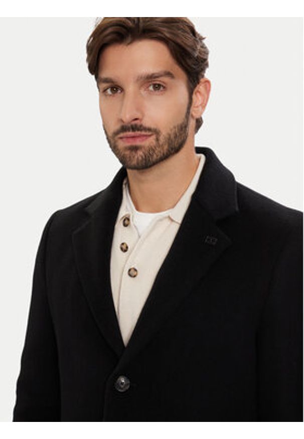 TOMMY HILFIGER - Tommy Hilfiger Płaszcz wełniany MW0MW40768 Czarny Regular Fit. Kolor: czarny. Materiał: wełna