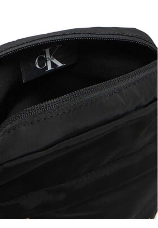 Calvin Klein Jeans Saszetka Sport Essentials Reporter 18 LV04G3000G Czarny. Kolor: czarny. Materiał: materiał