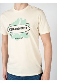 Guess T-Shirt "LA Logo" | M3GI61K9RM1 | Mężczyzna | Żółty. Okazja: na co dzień. Kolor: żółty. Materiał: bawełna. Długość: długie. Wzór: nadruk. Styl: elegancki, casual #3