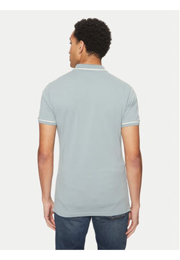 Calvin Klein Jeans Polo J30J315603 Niebieski Slim Fit. Typ kołnierza: polo. Kolor: niebieski. Materiał: bawełna