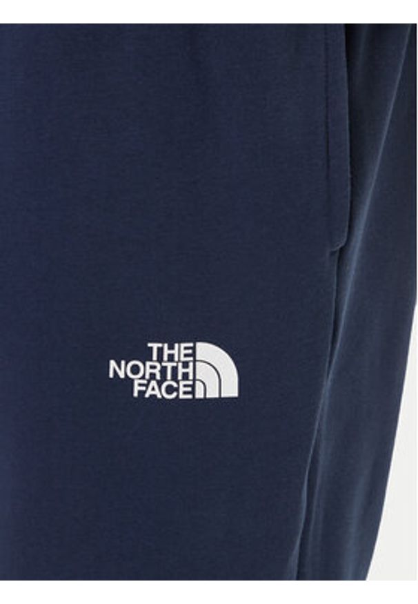 The North Face Spodnie dresowe Simple Dome NF0A8C1W Granatowy Regular Fit. Kolor: niebieski. Materiał: bawełna