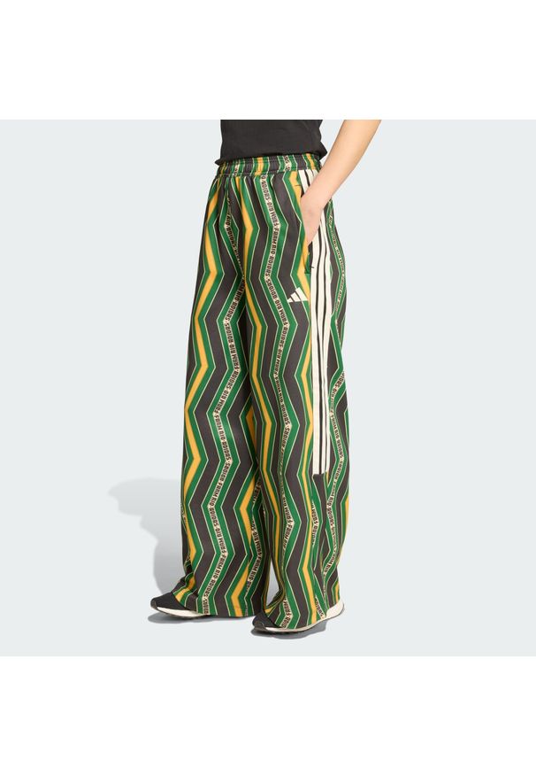 Adidas - Spodnie dresowe adidas x FARM Tiro. Kolor: czarny, zielony, żółty, wielokolorowy. Materiał: dresówka. Długość: długie. Sport: fitness